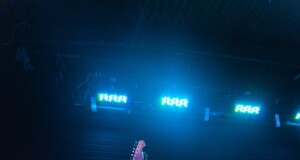 photo of electric guitar and drum set